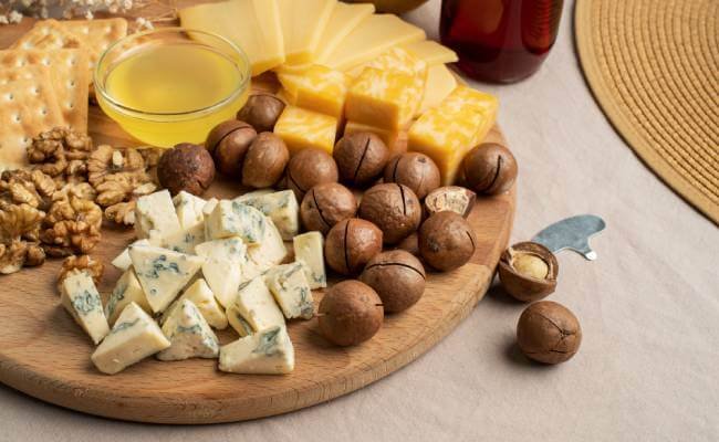 Cheese boards with nuts and olives
